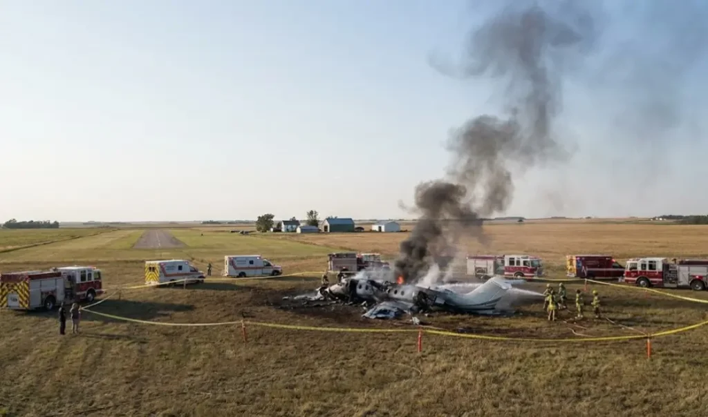 The Crash Site This image depicts the scene of the crash, showing the wreckage and emergency response.