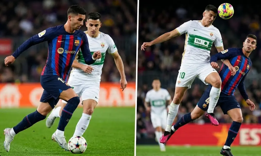Key players Ferran Torres (left) of FC Barcelona and Álvaro Rodríguez (right) of Elche C.F. in action during the match.