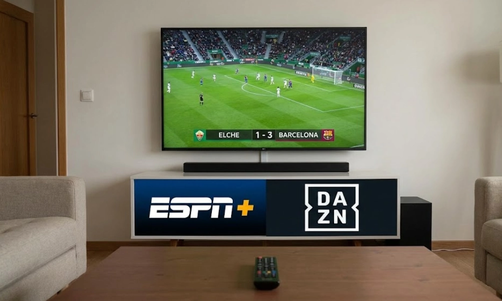 Fans can watch the Elche C.F. vs. FC Barcelona match on platforms like ESPN+ and DAZN, as shown on this living room television setup.